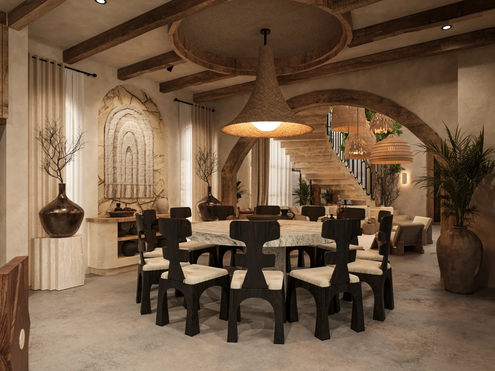 Dining room of a Riviera Maya villa with a stone table, carved timber chairs and a woven pendant