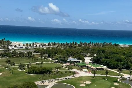 View from a Hotel Zone tower over the golf course to the Caribbean