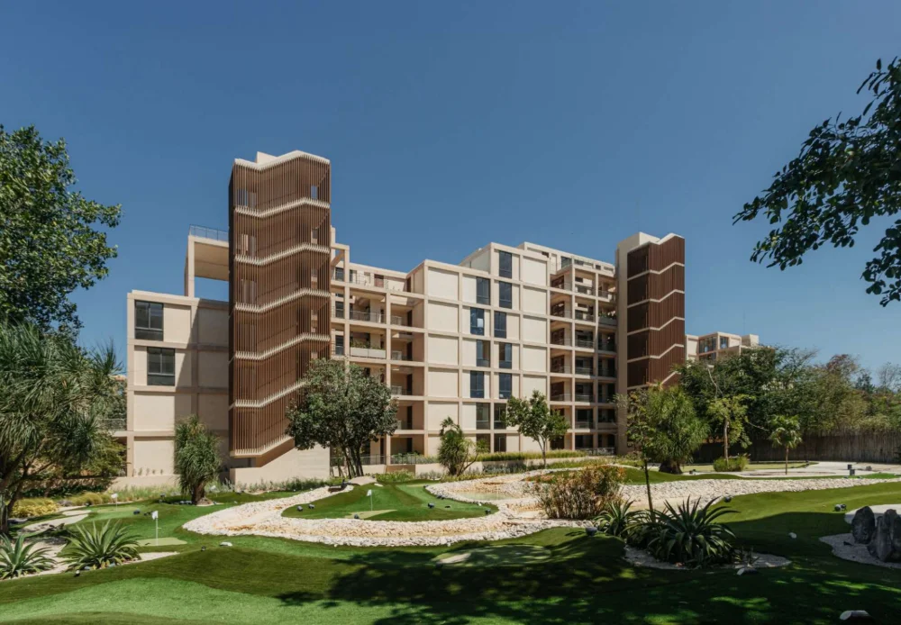 Building at The Village, Corasol, seen across the mini golf course between holes five, six and nine