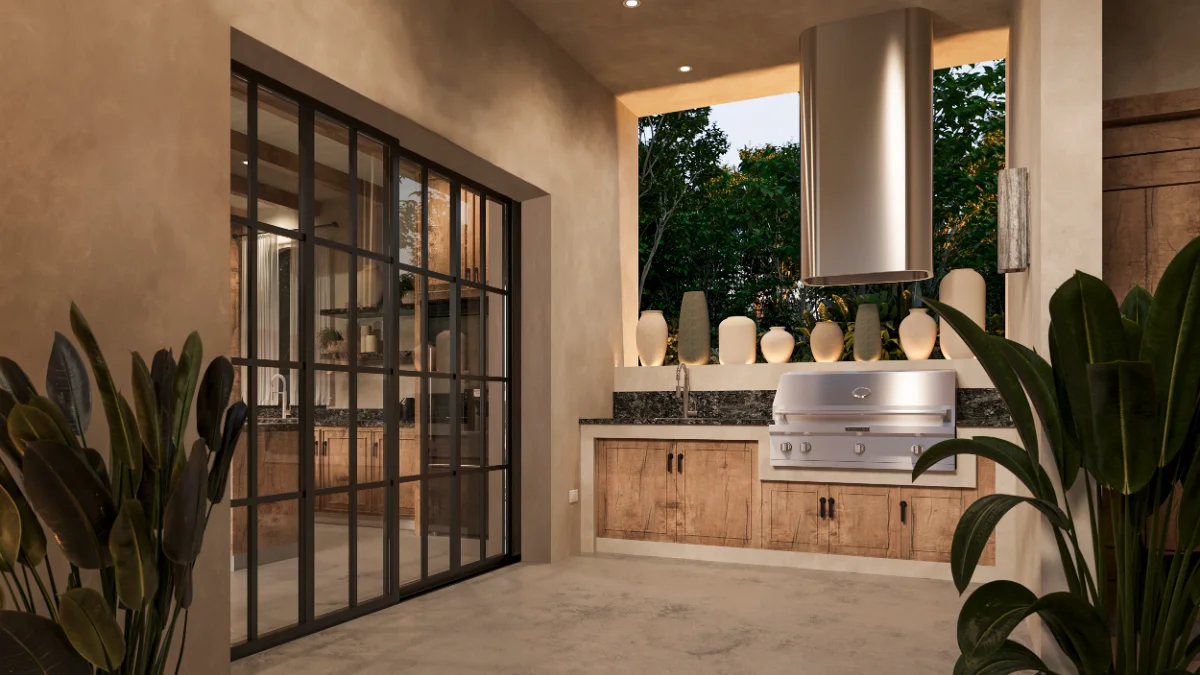 Outdoor grill terrace of a Riviera Maya villa with a stainless hood, granite counter and jungle beyond the opening
