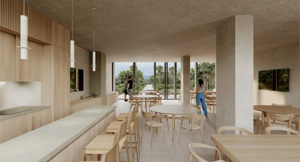 Multipurpose residents lounge with dining tables and jungle views