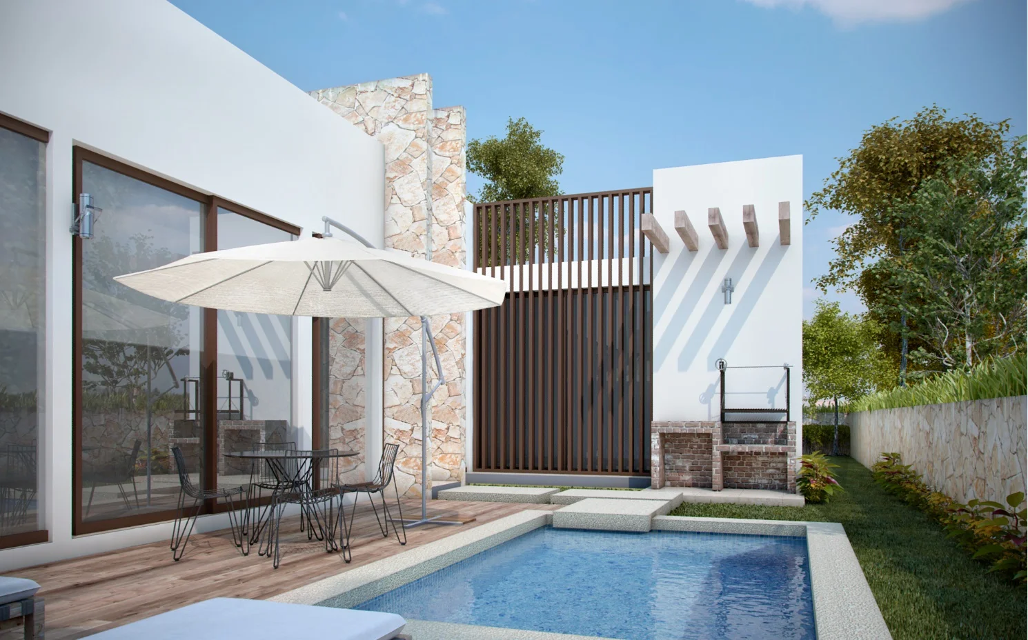 Modelo Barbados de Villas Caribe, alberca de nado y deck de madera entre la casa y un muro de piedra, con asador de ladrillo