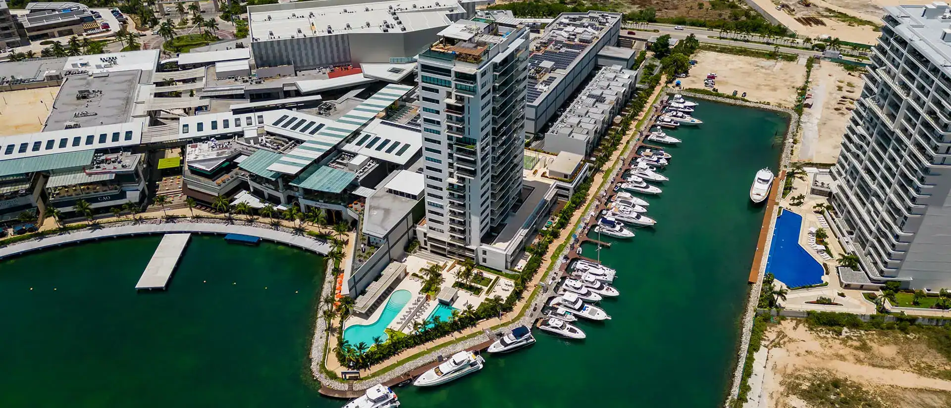 Aerial view of the master-planned Cancun Marina community and its surrounding canal system.