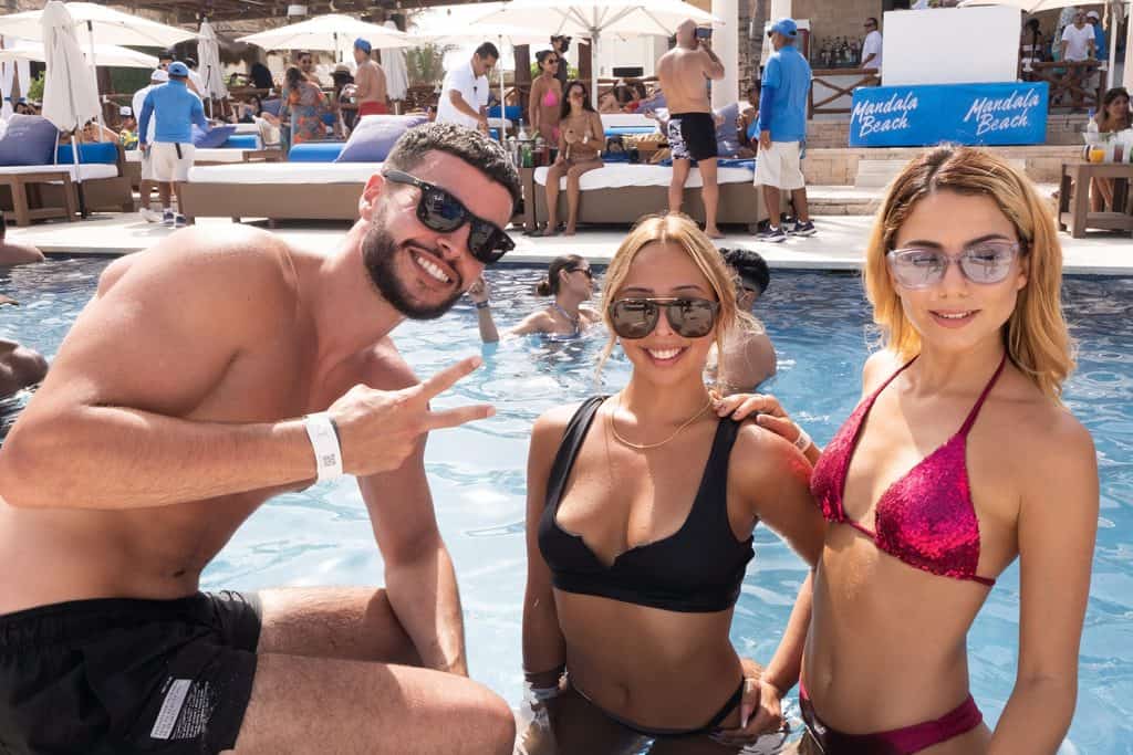 Pool enjoying the vibe at a luxury beach club in Cancun
